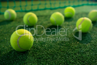 Close up of tennis balls on court