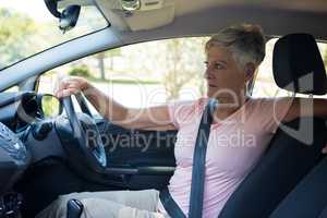 Senior woman driving a car