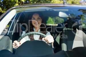 Beautiful woman driving a car