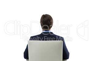 Businessman looking at invisible virtual screen against white background