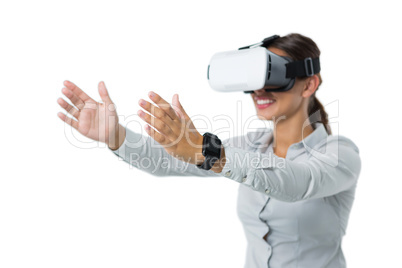 Female executive using virtual reality headset