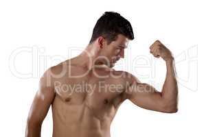 Determined shirtless sportsman flexing muscles