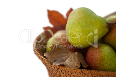 Close-up of pears in wicker basket