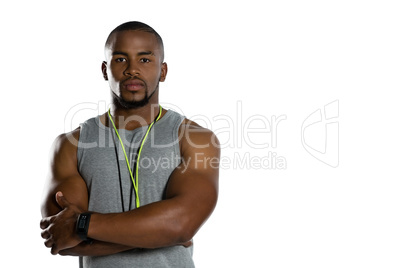 Portrait of male trainer with arms crossed