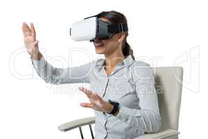 Female executive using virtual reality headset