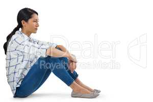 Woman relaxing against white background