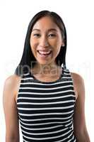 Smiling woman standing against white background