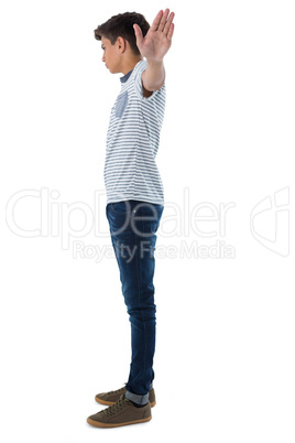 Teenage boy with his arms wide open