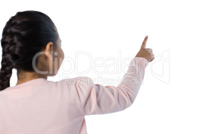 Girl pressing an invisible virtual screen