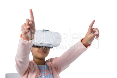 Girl gesturing while using virtual reality headset