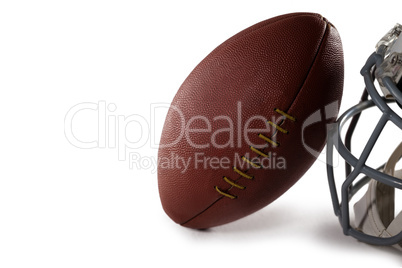 Close-up of American Football and helmet