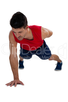 Full length of sports player exercising