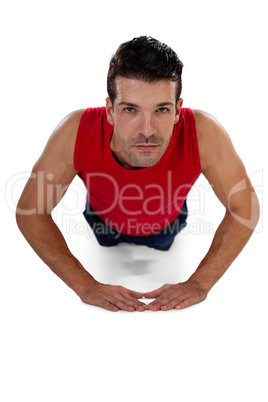 Portrait of determined sports player exercising