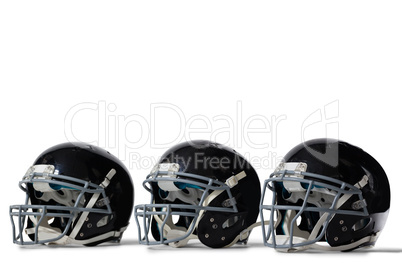 Close up of black sports helmets arranged side by side