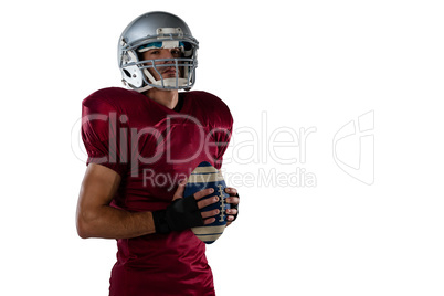 Portrait of sportsman with American football