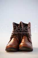 Pair of shoes against white background