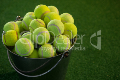 Tennis balls in bucket