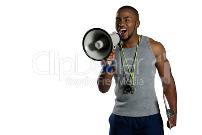Male rugby instructor announcing on megaphone
