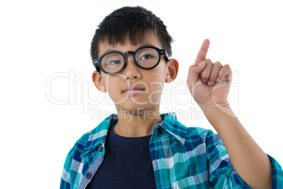 Boy pretending to touch an invisible screen