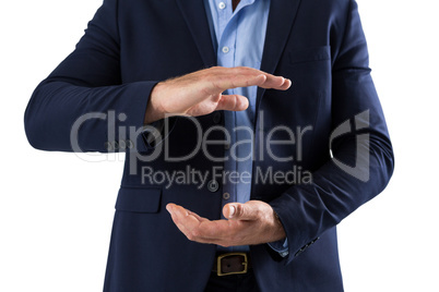 Businessman pretending to hold something