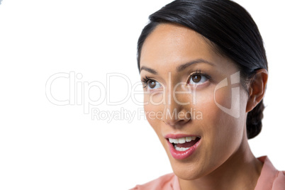 Thoughtful woman against white background