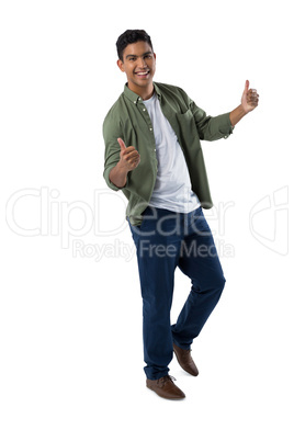 Happy man gesturing against white background