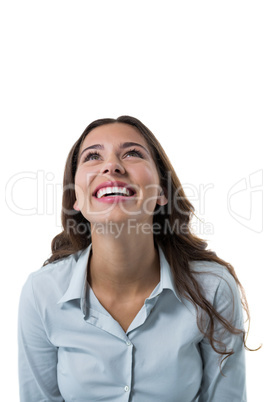 Thoughtful female executive against white background