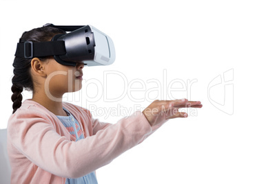 Girl gesturing while using virtual reality headset