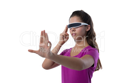 Teenage girl using virtual reality glasses