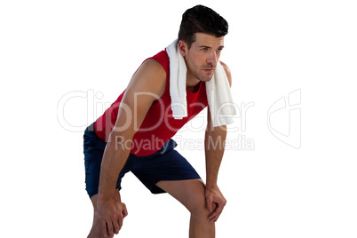 Sportsman with napkin looking away white bending