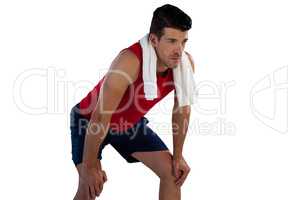Sportsman with napkin looking away white bending