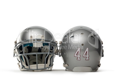 Close up of silver colored sports helmets