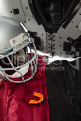 High angle view of chest protector with sports uniform