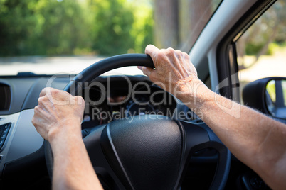 Senior woman driving a car