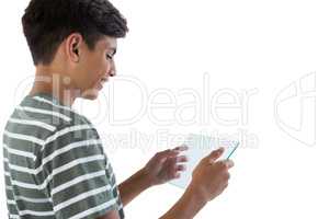 Teenage boy using a glass digital tablet