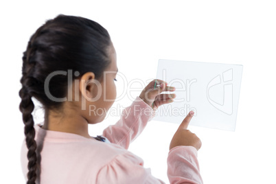 Girl using a glass digital tablet