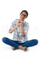 Woman showing thumbs up against white background