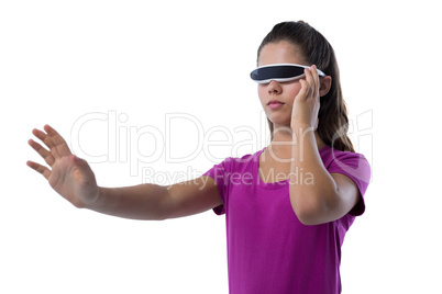 Teenage girl using virtual reality glasses