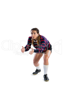 Female rugby player in catching position