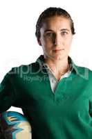 Close up portrait of confident female rugby player