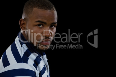 Close up portrait of confident rugby player