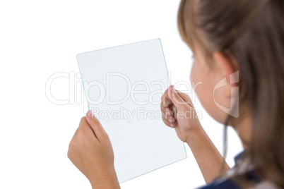 Close-up of girl using glass digital tablet Close-up of girl using glass digital tablet