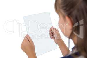 Close-up of girl using glass digital tablet