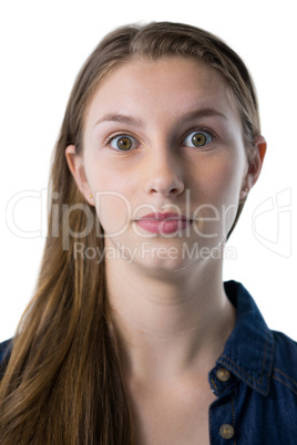 Confident teenage girl looking at camera