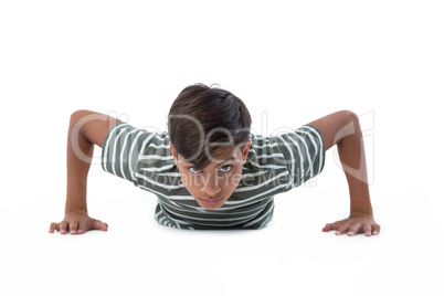 Teenage boy performing push ups