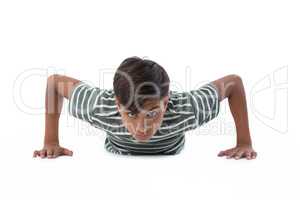 Teenage boy performing push ups