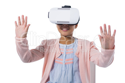 Girl gesturing while using virtual reality headset