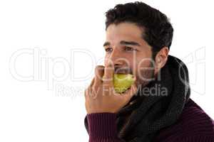 Close-up of man eating pears