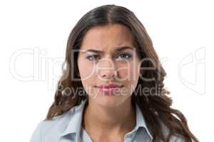 Confused female executive against white background