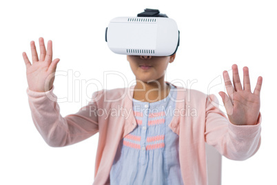 Girl gesturing while using virtual reality headset